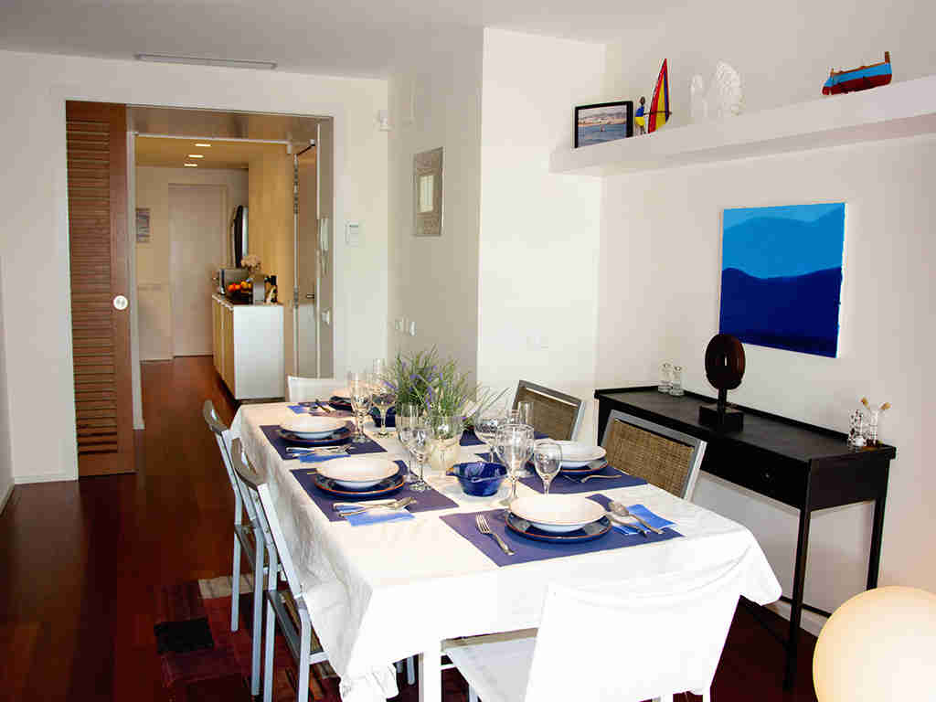 large dining room of the sitges apartments with pool