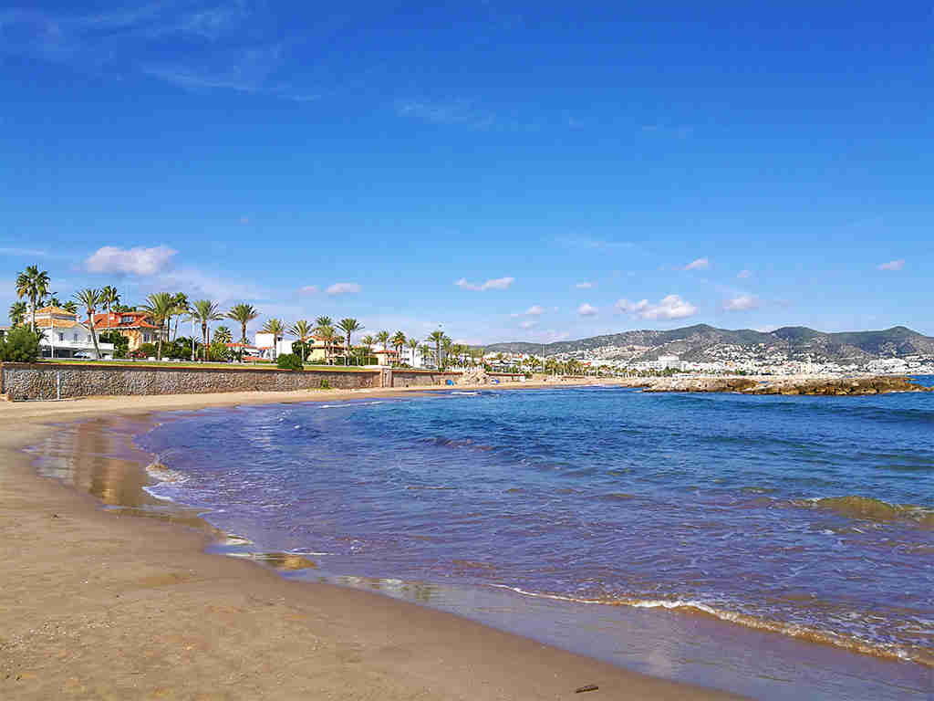 the cute sitges promenade from the beach